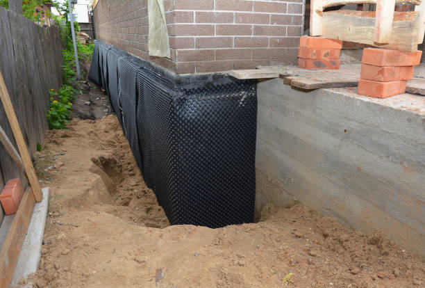 Happy homeowners after waterproofing job in Sayreville